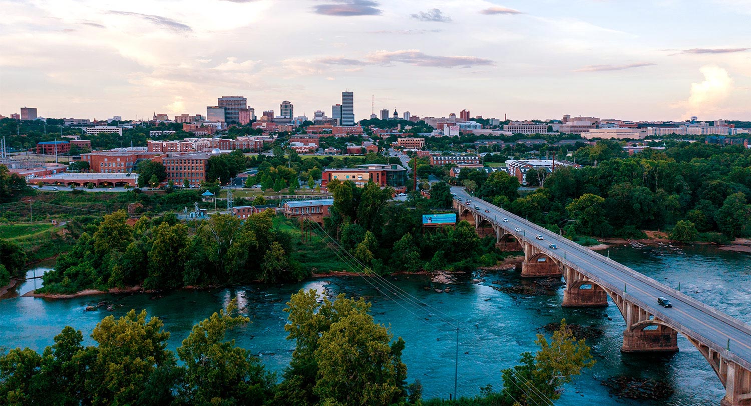 View of the Columbia skyline with the river in the foreground.