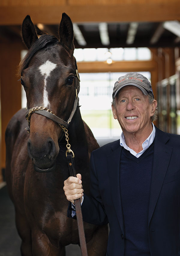 Peter McCausland in the Mares Barn with one of his horses, Pem.