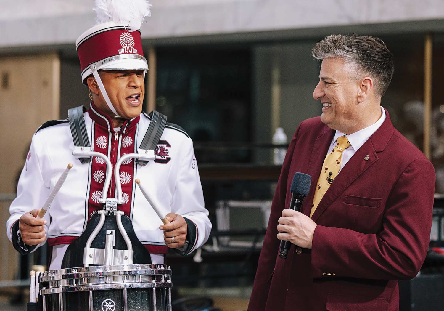 Craig Melvin, who became an honorary Carolina bandmember for a segment NBC’s TODAY, speaks with Carolina Band Director Jay Jacobs.